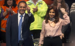 Scioli Buenos Aires' province governor and presidential candidate for the Victory Front and Argentine President Fernandez wave to their supporters during a rally in Buenos Aires