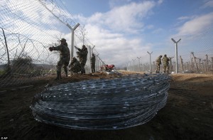 Macedonia erects second barrier of razor wire to stem the human tide from Greece