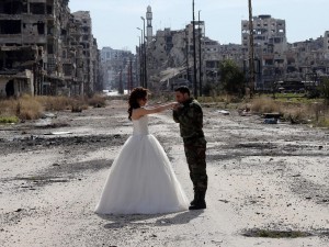 Syrian couple take their wedding photos in the country's most devastated city