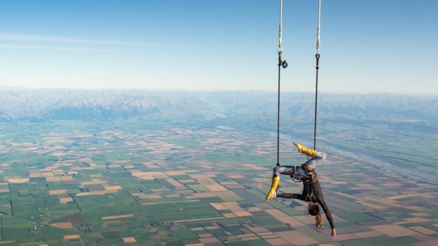 Woman sets world record for highest trapeze act