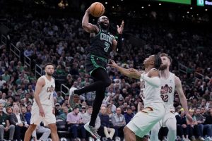 Boston Celtics guard Jaylen Brown (7) drives to the basket against the Cleveland Cavaliers during the second half of Game 5 of an NBA basketball second-round playoff series Wednesday, May 15, 2024, in Boston. The Celtics advanced to the Eastern Conference finals  (AP Photo/Charles Krupa)