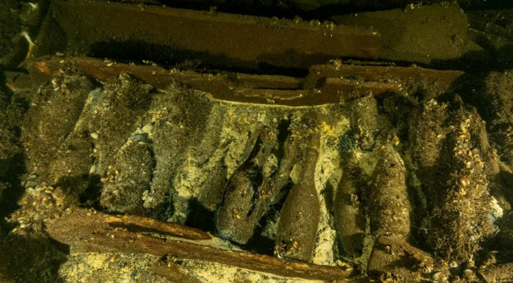 Divers find 19th-century shipwreck laden with unopened bottles of champagne