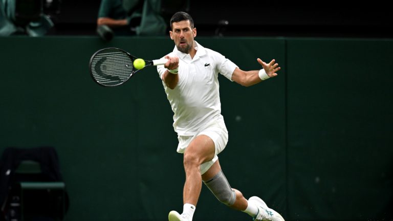 LONDON, ENGLAND - JULY 06: Novak Djokovic of Serbia plays a forehand against Alexei Popyrin of Australia in the Gentlemen's Singles third round match during day six of The Championships Wimbledon 2024 at All England Lawn Tennis and Croquet Club on July 06, 2024 in London, England. (Photo by Mike Hewitt/Getty Images)