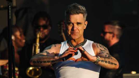 4 (11.30 uur) Robbie Williams vraagt