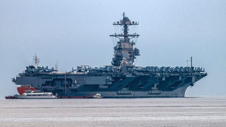 TRIESTE, ITALY - 2023/09/18: US Navy aircraft carrier USS Gerald R. Ford anchored at the Gulf of Trieste. The USS Gerald R. Ford is the largest warship in the world. (Photo by Andrej Tarfila/SOPA Images/LightRocket via Getty Images)