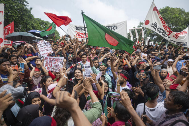 Activists take part in a protest march against Prime Minister Sheikh Hasina and her government to demand justice for more than 200 people killed in last month's violent demonstrations, in Dhaka, Bangladesh, Friday, Aug. 2, 2024. (AP Photo/Rajib Dhar)