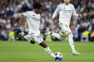 MADRID, SPAIN - SEPTEMBER 17: Endrick Felipe Moreira de Sousa of Real Madrid CF (C) kicks the ball to score his goal during the UEFA Champions League 2024/25 League Phase MD1 match between Real Madrid C.F. and VfB Stuttgart at Estadio Santiago Bernabeu on September 17, 2024 in Madrid, Spain. (Photo by Alberto Gardin/Eurasia Sport Images/Getty Images)