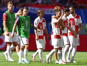 Soccer Football - Euro 2024 - Group B - Croatia v Albania - Hamburg Volksparkstadion, Hamburg, Germany - June 19, 2024 Croatia's Luka Modric and teammates look dejected after the match REUTERS/Lisi Niesner
