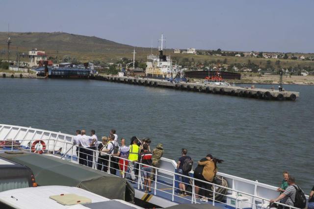 Ukrainian attack on ferry kills one in Russian port