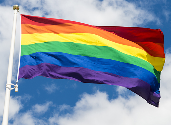 Pride flag. HBTQ flag. Rainbow flag. Fluttering in the wind