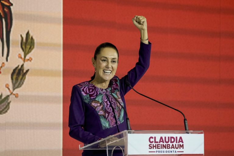 Ruling party presidential candidate Claudia Sheinbaum addresses supporters after the National Electoral Institute announced she held an irreversible lead in the election in Mexico City, early Monday, June 3, 2024. (AP Photo/Eduardo Verdugo)